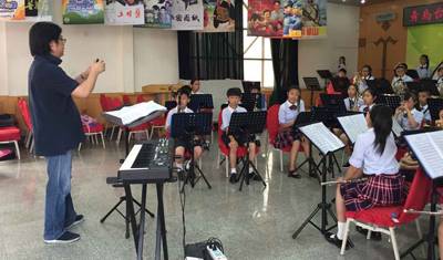 15vip太阳成示范乐团青岛台东六路小学管乐团大师班活动成功举办